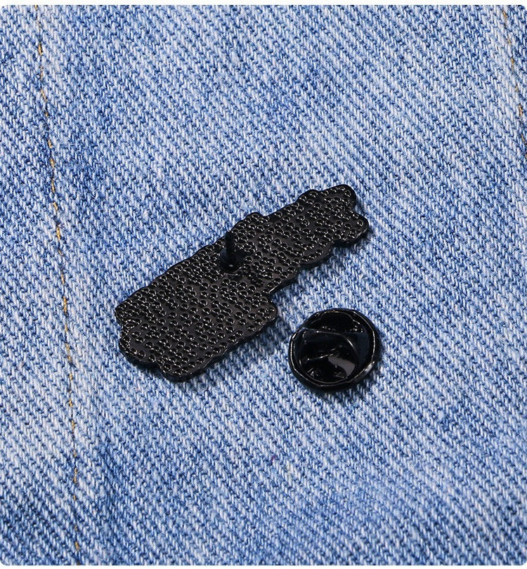 Back of You Gotta Be Fucking Kidding Enamel Pin showing the pin post and clasp