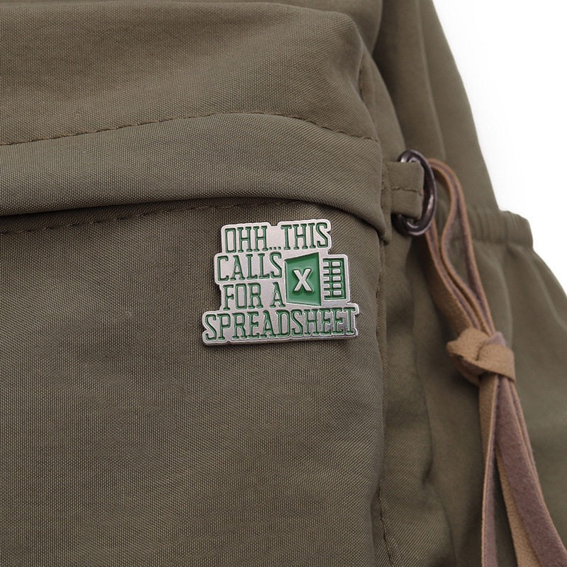 Green This Calls for a Spreadsheet quote pin on a pale pink background