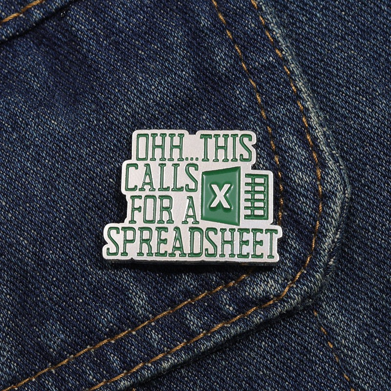 This Calls for a Spreadsheet enamel pin on dark denim